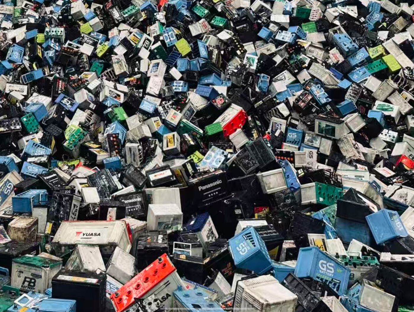 Pile of used lead-acid batteries at the receiving bay